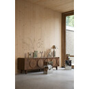 Zuiver Groove Large Walnut Sideboard displaying various decorations in a living room